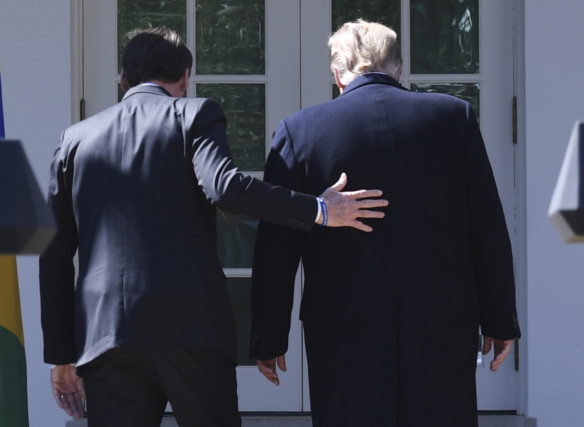 ￼ Bolsonaro recebido por Trump na Casa Branca, em março de 2019 (Foto: JIM WATSON/AFP)