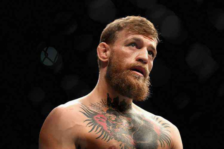 Conor McGregor retornar&aacute; ao oct&oacute;gono, deixando a aposentadoria pela terceira vez (Foto: Harry How/AFP)