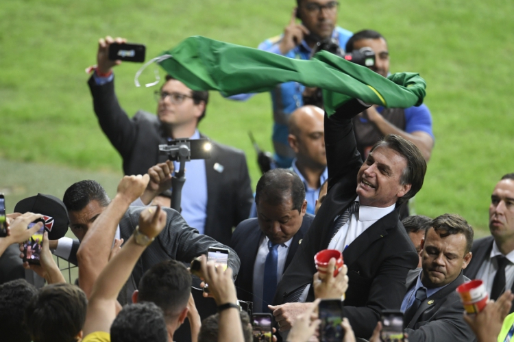Jair Bolsonaro durante o jogo do Brasil contra a Argentina(foto:  Mauro PIMENTEL / AFP)