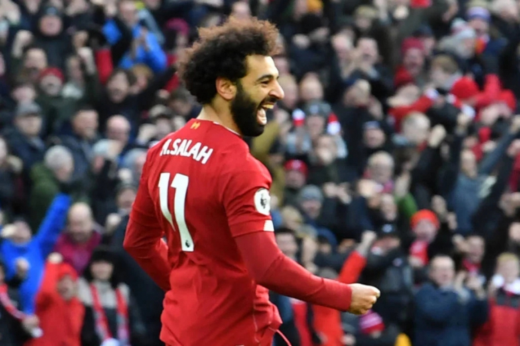 Salah chegou a marca de nove gols no Inglês
(foto: AFP)