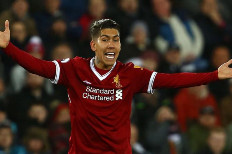 O brasileiro Roberto Firmino tentará trazer o primeiro título mundial para o Liverpool(foto: AFP)