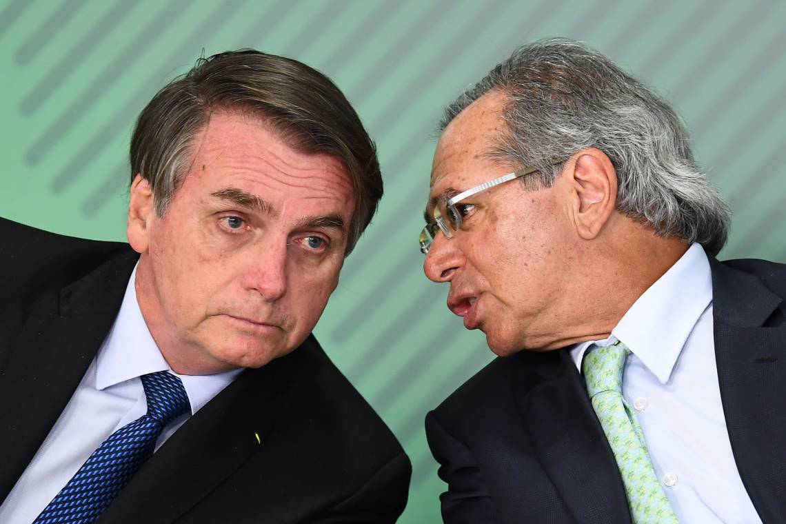 ￼PRESIDENTE JAIR Bolsonaro e o ministro da Economia, Paulo Guedes (Foto: EVARISTO SA / AFP)