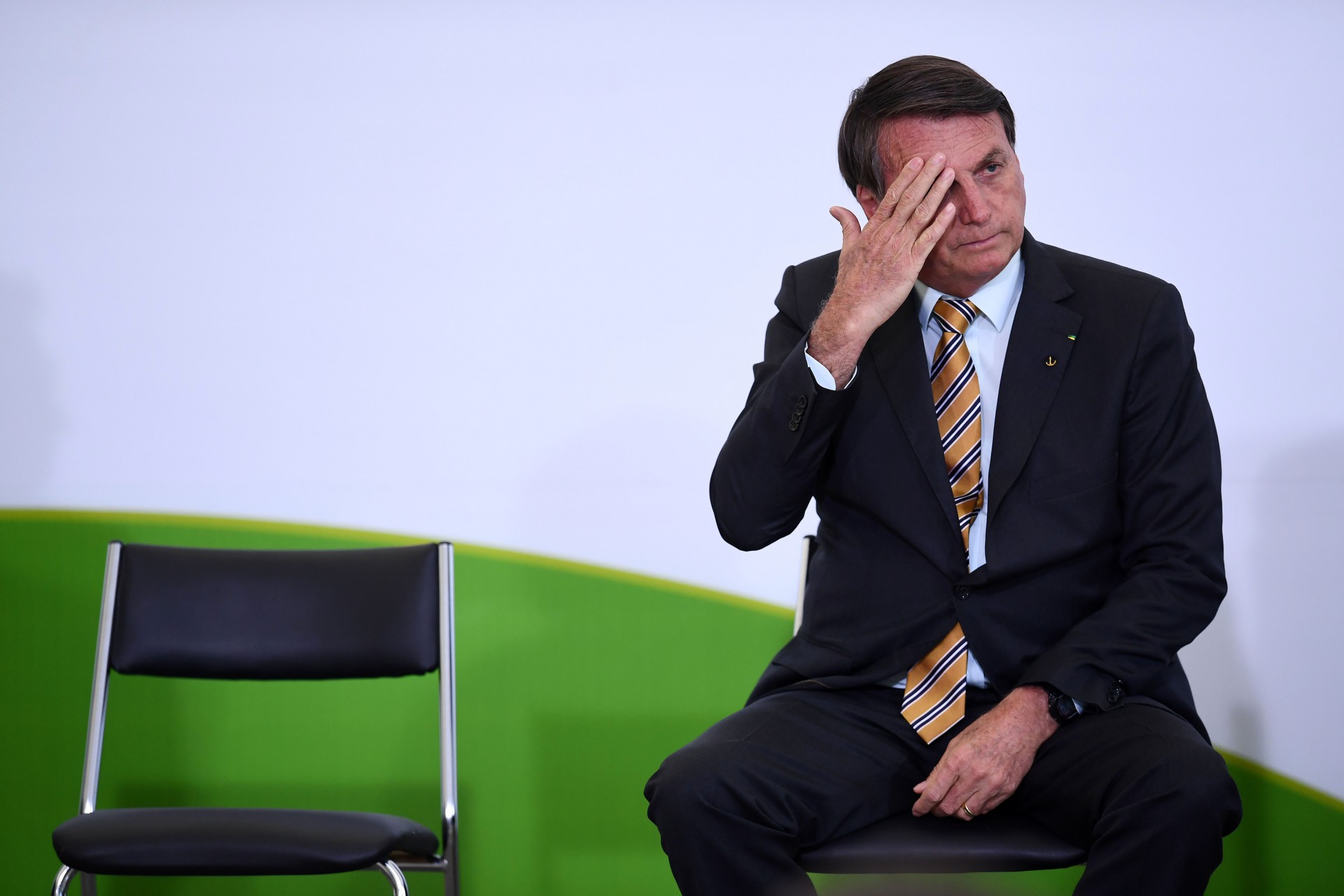 O presidente Jair Bolsonaro durante o lançamento de um programa de retomada do turismo, setor gravemente afetado pelo novo surto de coronavírus, no Palácio do Planalto, em Brasília, em 10 de novembro de 2020.  (Foto de EVARISTO SA / AFP) (Foto: EVARISTO SA / AFP)
