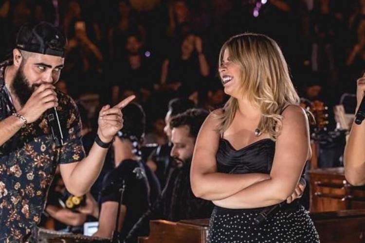 Henrique, dupla com Juliano, homenageia Marília Mendonça.