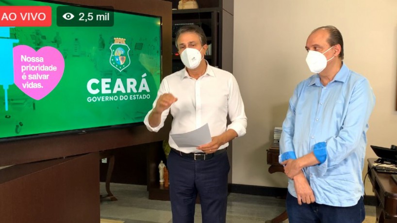 Camilo e o secretário da Saúde em anúncio de novas medidas de contenção  da Covid-19(foto: Reprodução/Facebook)