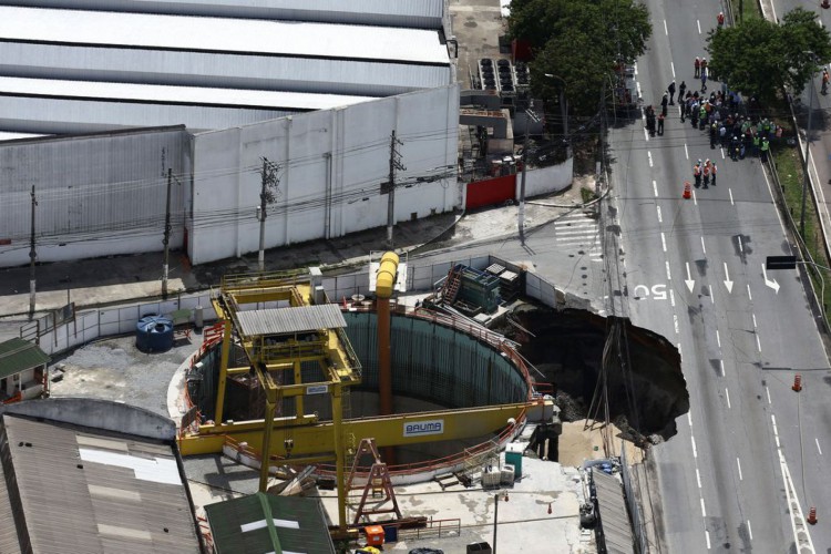 An aerial view shows part of an expressway collapsed above a construction site where Spain's Acciona SA was excavating a tunnel for a new metro line in Sao Paulo, Brazil, February 1, 2022. REUTERS/Carla Carniel 