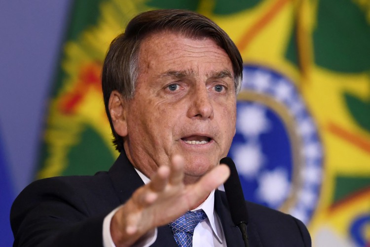 Bolsonaro convoca apoiadores a entrarem com (Foto: EVARISTO SA/AFP)
