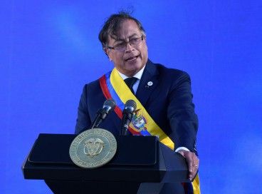 Colombia's new President Gustavo Petro delivers a speech after swearing in during his inauguration ceremony at Bolivar Square in Bogota, on August 7, 2022. - Gustavo Petro on Sunday took the oath of office as Colombia's first-ever leftist president, before a crowd of hundreds of thousands at his inauguration in Bogota. (Photo by Juan BARRETO / AFP) 