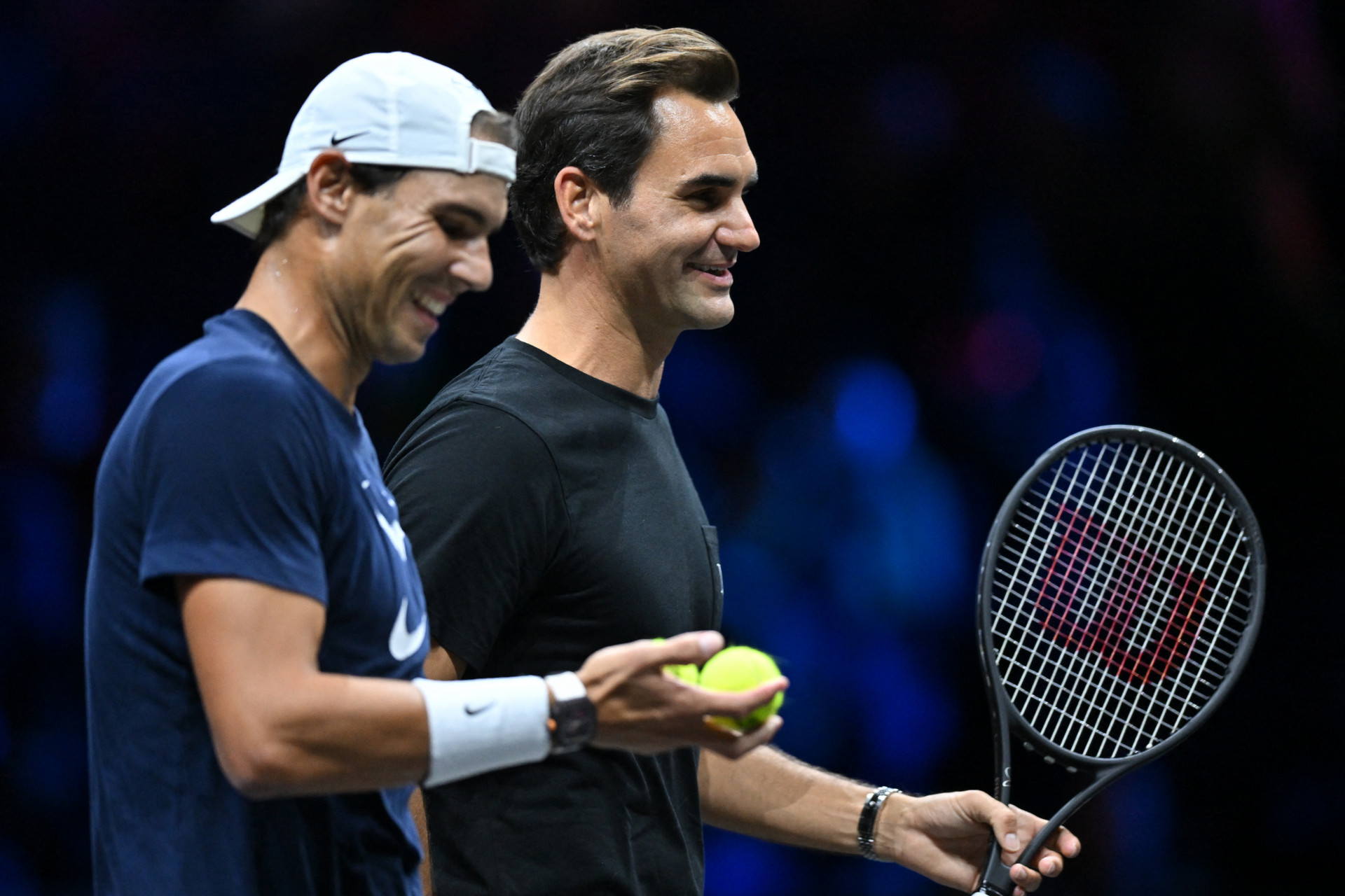 Rafael Nadal e Roger Federer em treino antes da Laver Cup (Foto: Glyn KIRK / AFP)