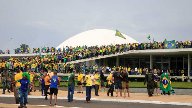 Supporters of Brazilian former President Jair Bolsonaro invade the National Congress in Brasilia ...