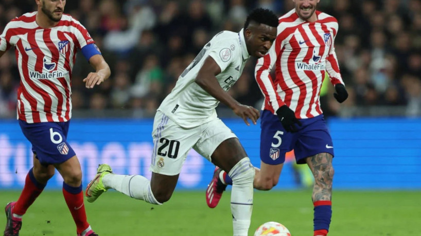 Vinicius Jr em ação pelo Real Madrid contra o Atlético