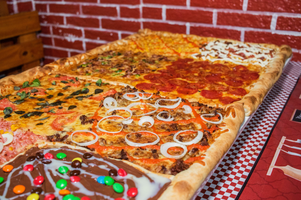 A pizzaria Top Fam&iacute;lia traz a proposta de pizza diferenciada, como a pizza de 1 metro