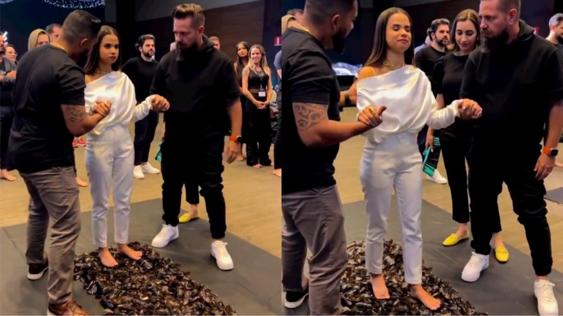 Mulher realizou dinâmica que, segundo o organizador do evento, é feita para que os participantes 