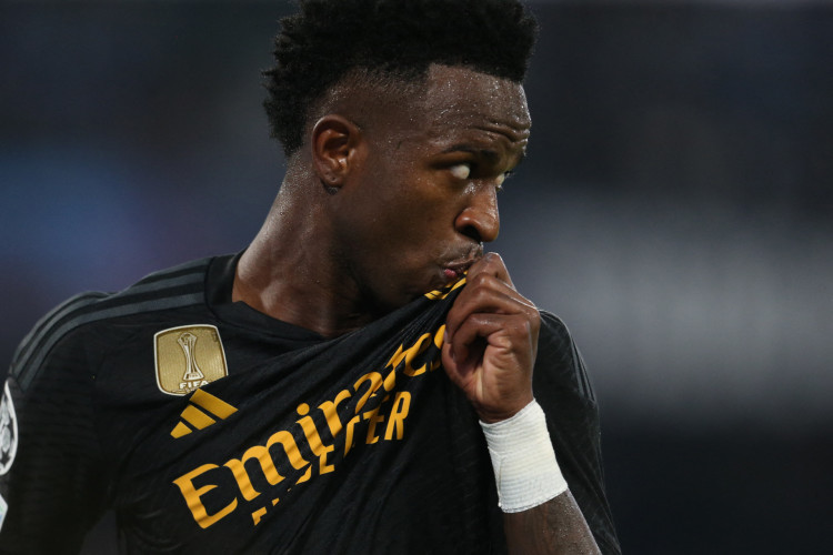 Atacante Vinícius Junior comemora gol no jogo Napoli x Real Madrid pela Champions League