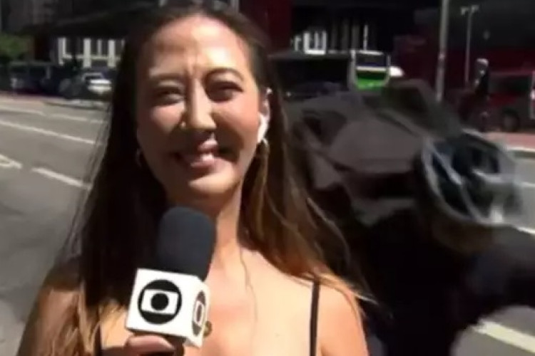 Repórter quase teve o smartphone levado por ciclista enquanto fazia entrada ao vivo no programa Encontro