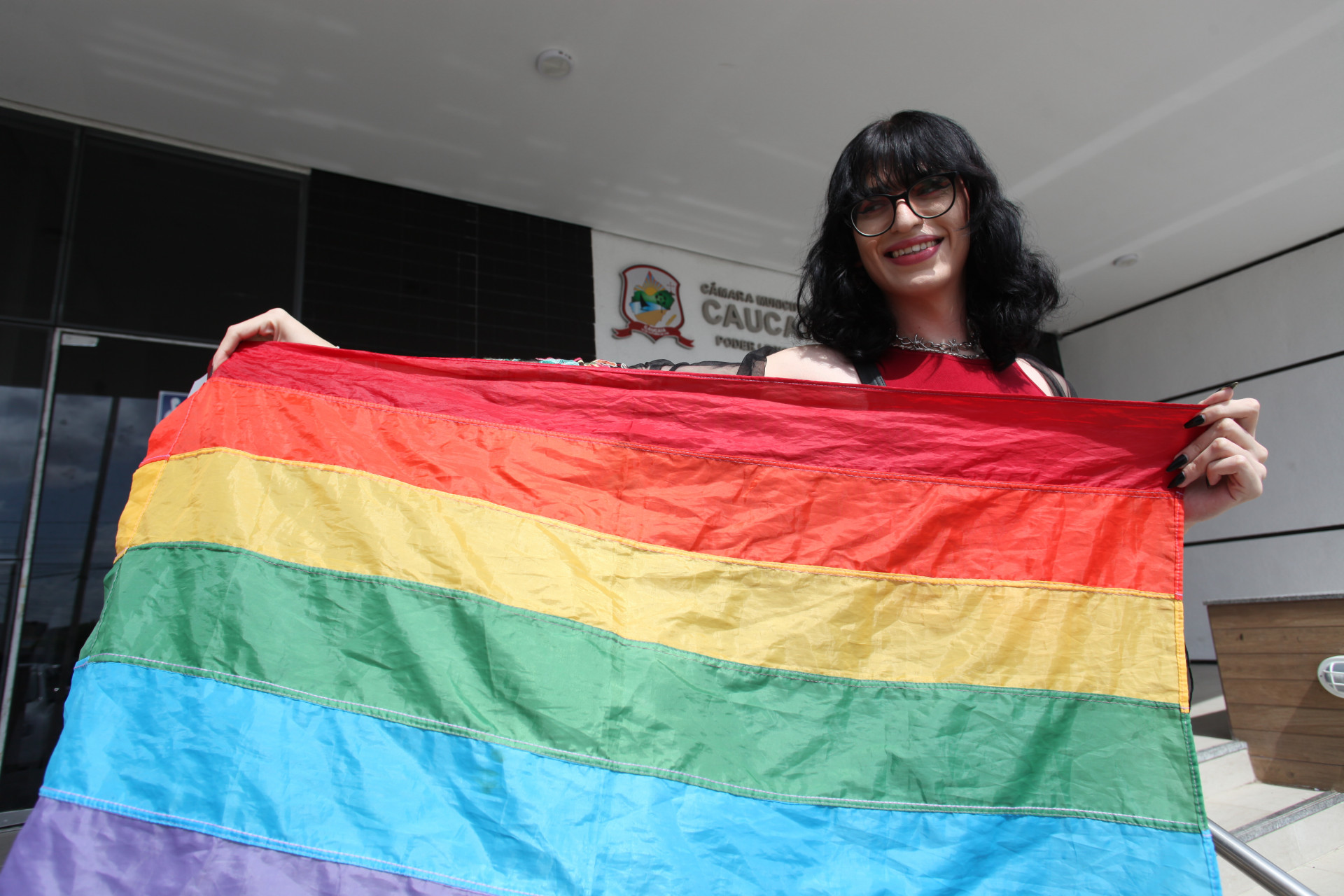 CAUCAIA, CEARÁ, BRASIL, 31.01.2024: Miles June, 27 design. Cerimônia de entrega das certidões de nascimento retificadas de 46 pessoas trans e travestis