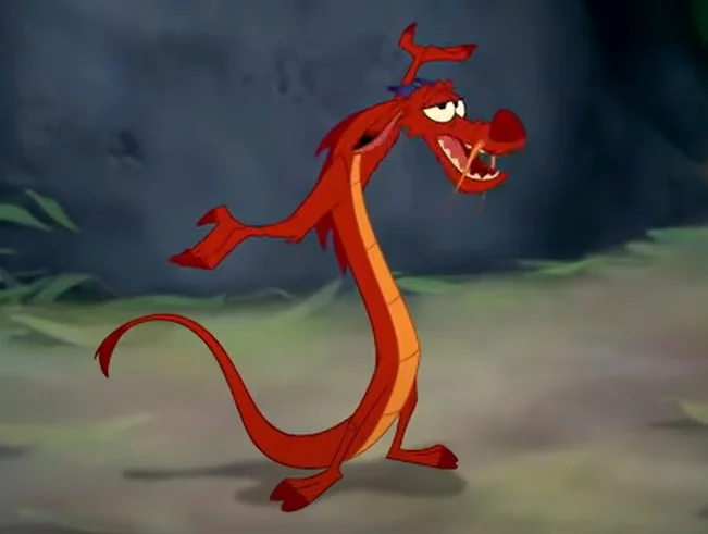 Personagem: Mushu - Filme: Mulan - Sua personalidade forte e seu carisma fizeram de Mushu um dos motivos para o filme Mulan ser adorado por tantos fãs. Destaque para sua impulsividade e seu jeito extremamente engraçado. 