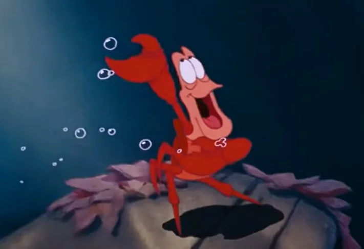 Personagem: Sebastião - Filme: Pequena Sereia - Sua paixão por música e sua inteligência são duas das diversas características que colocam esse pequeno caranguejo no coração de muitos fãs de A Pequena Sereia. 