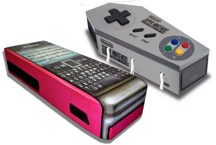 E que tal esses caixões tecnológicos, em forma de telefone celular  e de controle de videogame? Morrer não é brincadeira... Mas..