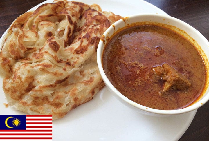 2º lugar - Roti Canai (Malásia) - Pão achatado servido com curry que tem variações doces e salgadas e pode levar carne, ovos ou queijo. 