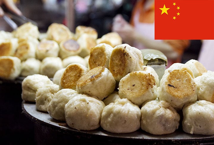 12º lugar - Shengian Mantou (China) - Baozi (pão cozido no vapor), pequeno e frito, recheado com carne de porco e gelatina que derrete formando uma sopa quando cozido.