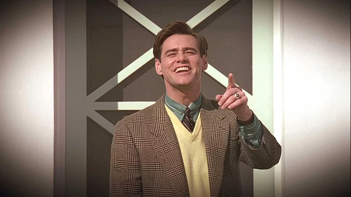 Em 1998, Jim Carrey ganhou seu primeiro protagonista fora da comédia escrachada, como Truman Burbank, na comédia dramática O Show de Truman - O Show da Vida.
