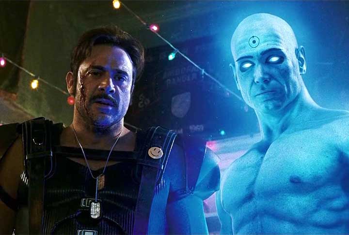 Seu personagem é crucial para a trama, com um passado sombrio e uma moralidade ambígua. O Comediante, cuja morte desencadeia os eventos do filme, é um agente de desordem com uma visão cínica da humanidade.