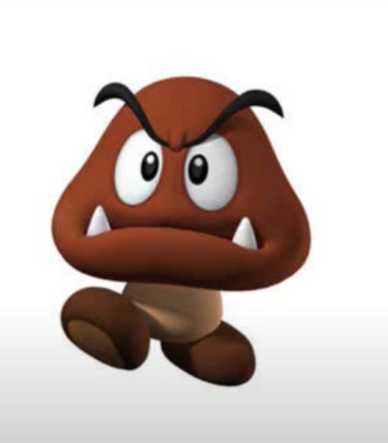 Nome do personagem: Goomba - Esse é um personagem importante e de destaque no jogo, já que é um inimigo que aparece constantemente no universo de Mario Bros. Eles são cogumelos que têm cara de mau, com diversas variações dele no game. Vale destacar que existem alguns que são do bem, como Goombario e Goombob. 
