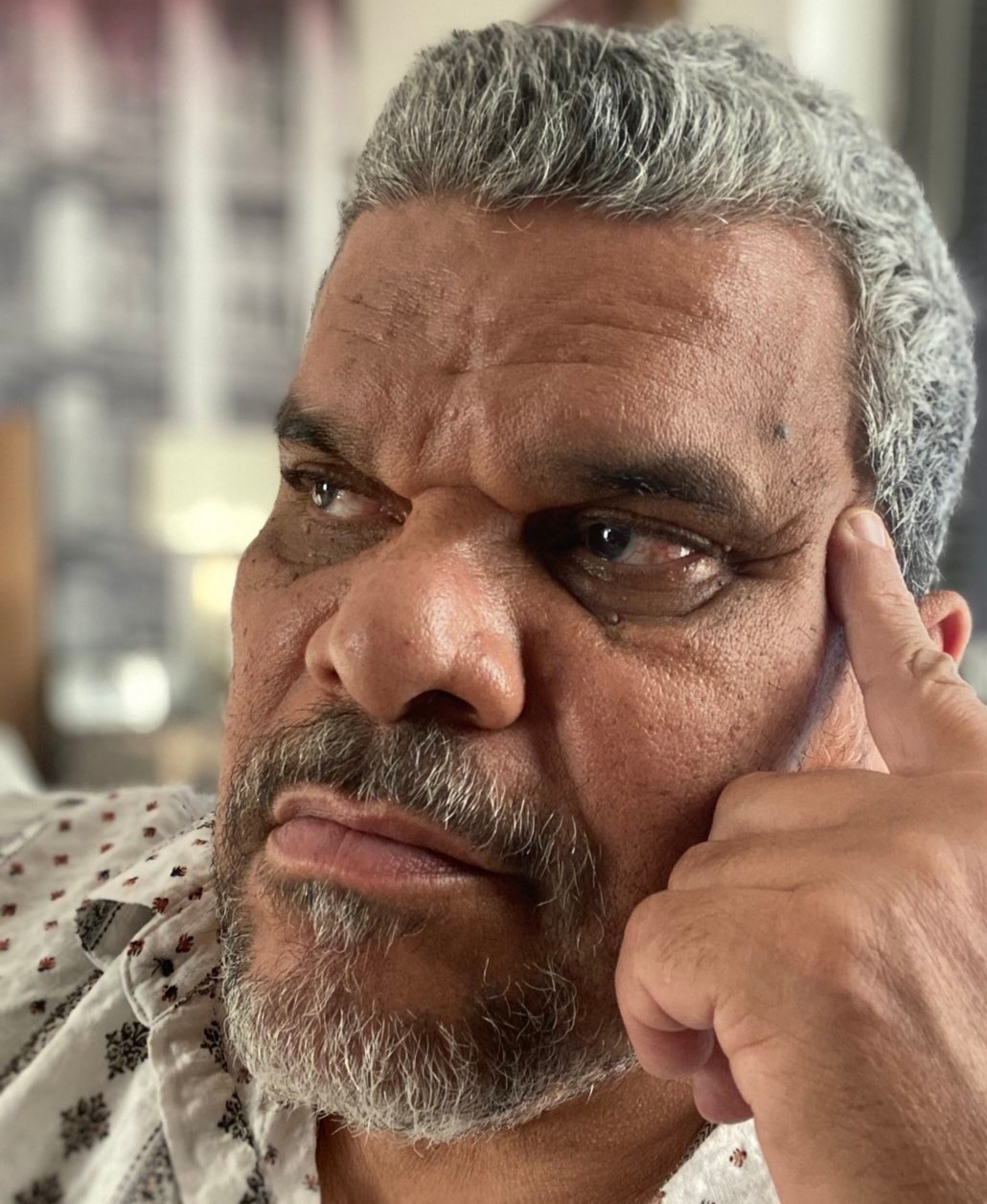 Guzmán nasceu na ilha caribenha de Porto Rico e cresceu em Nova York, onde atuou como assistente social antes de enveredar pela carreira artística. 
