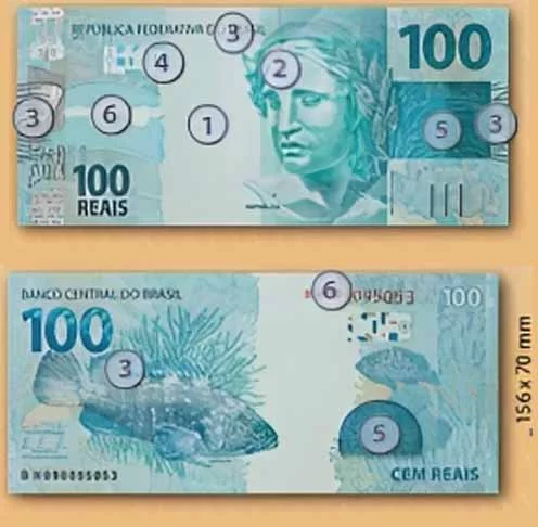 Por fim, a última dica é descobrir os números fluorescentes na cédula de real.