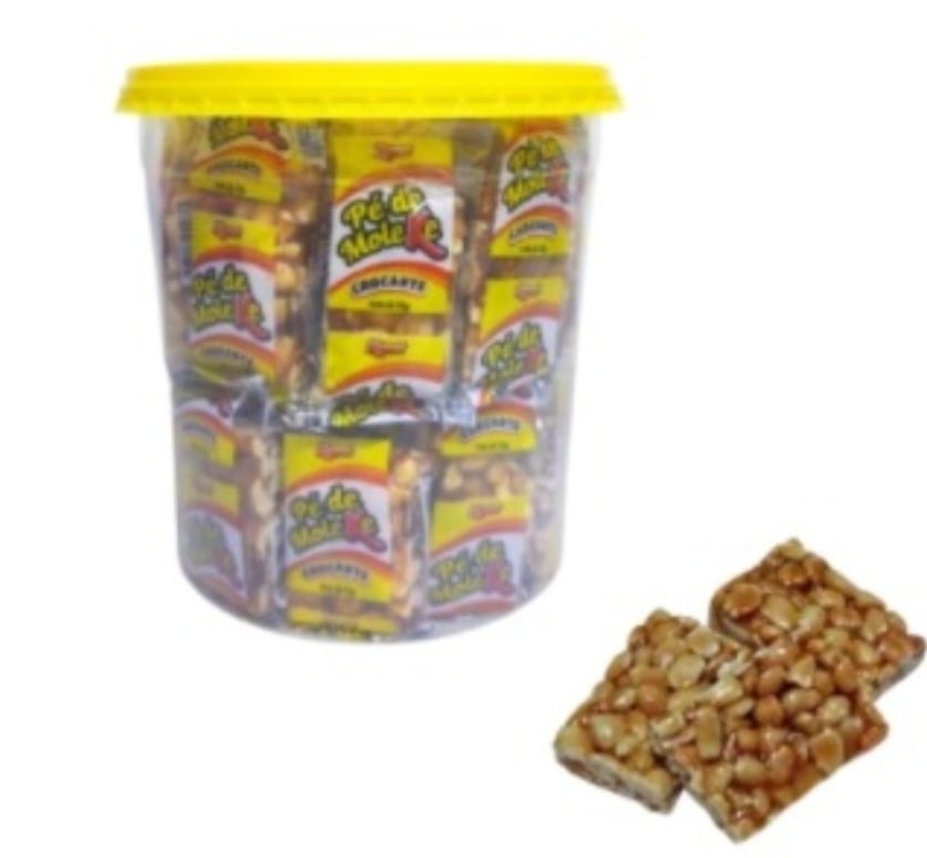 Pé-de-Moleque - Doce típico da culinária brasileira, feito a partir da mistura de amendoim torrado com rapadura. Surgiu em meados do século XVI, com a chegada da cana-de-açúcar ao Brasil.