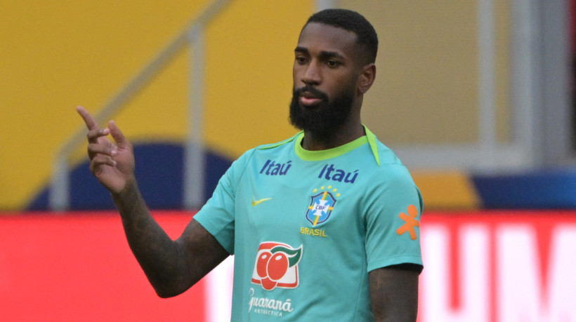 Gerson será titular no meio-campo da seleção
 (Foto: Nelson ALMEIDA / AFP)