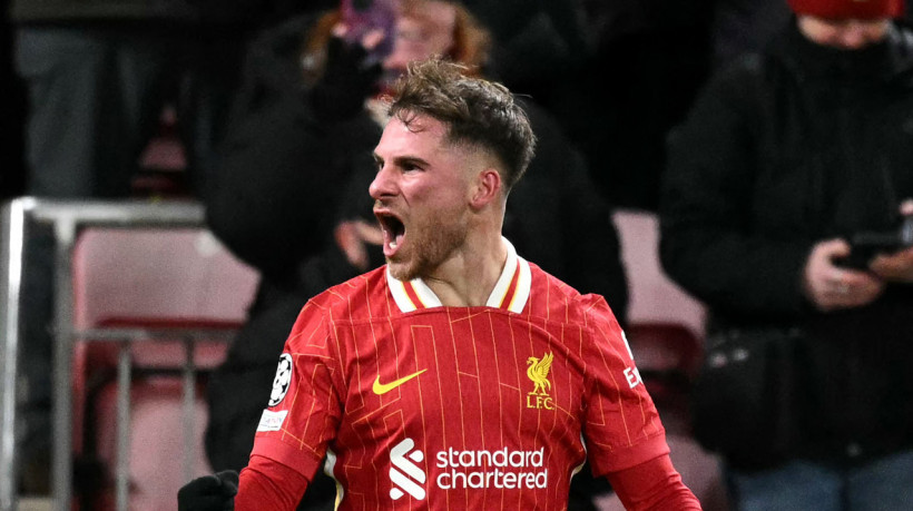 Mac Allister comemora gol no jogo Liverpool x Real Madrid, no Anfield, pela Champions League (Foto: Oli SCARFF / AFP)