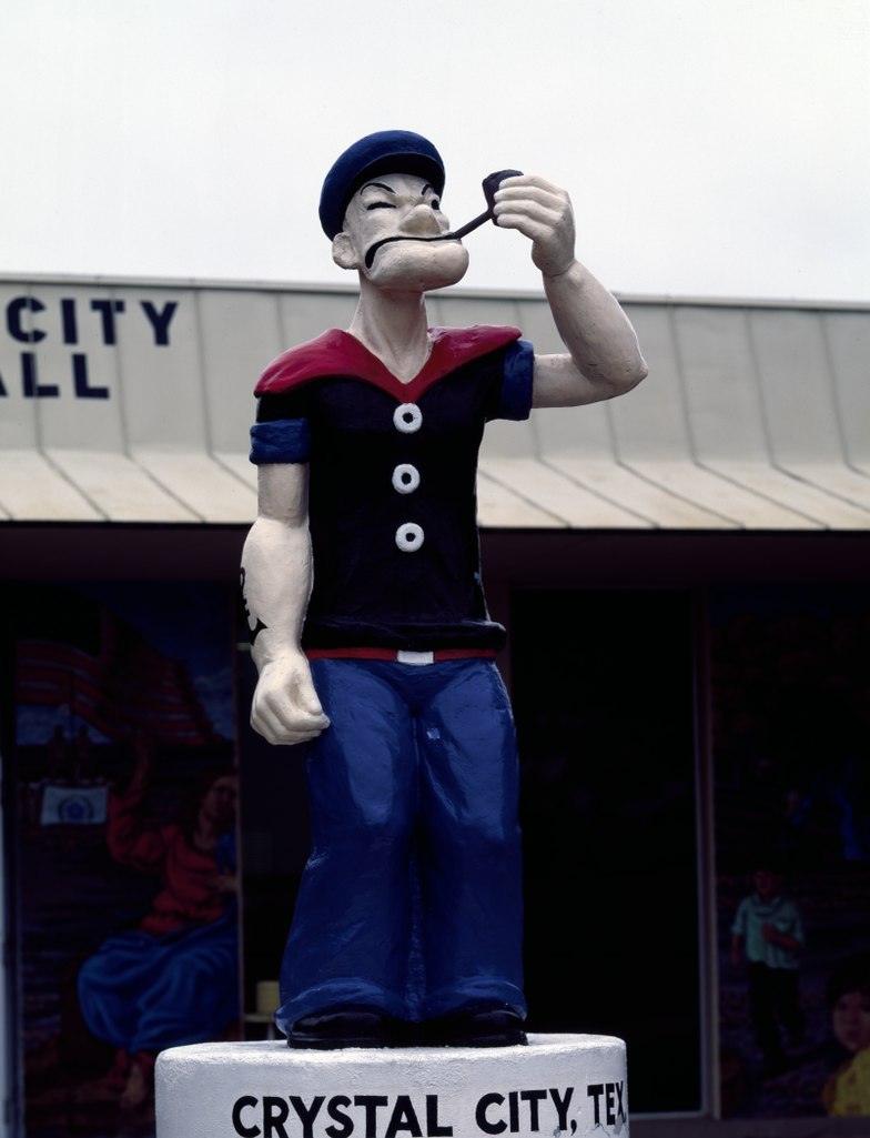 Uma curiosidade acerca de Popeye é que ele foi o primeiro personagem de quadrinhos a ser representado em uma estátua pública, em 1937, em Crystal City, no estado do Texas. 
