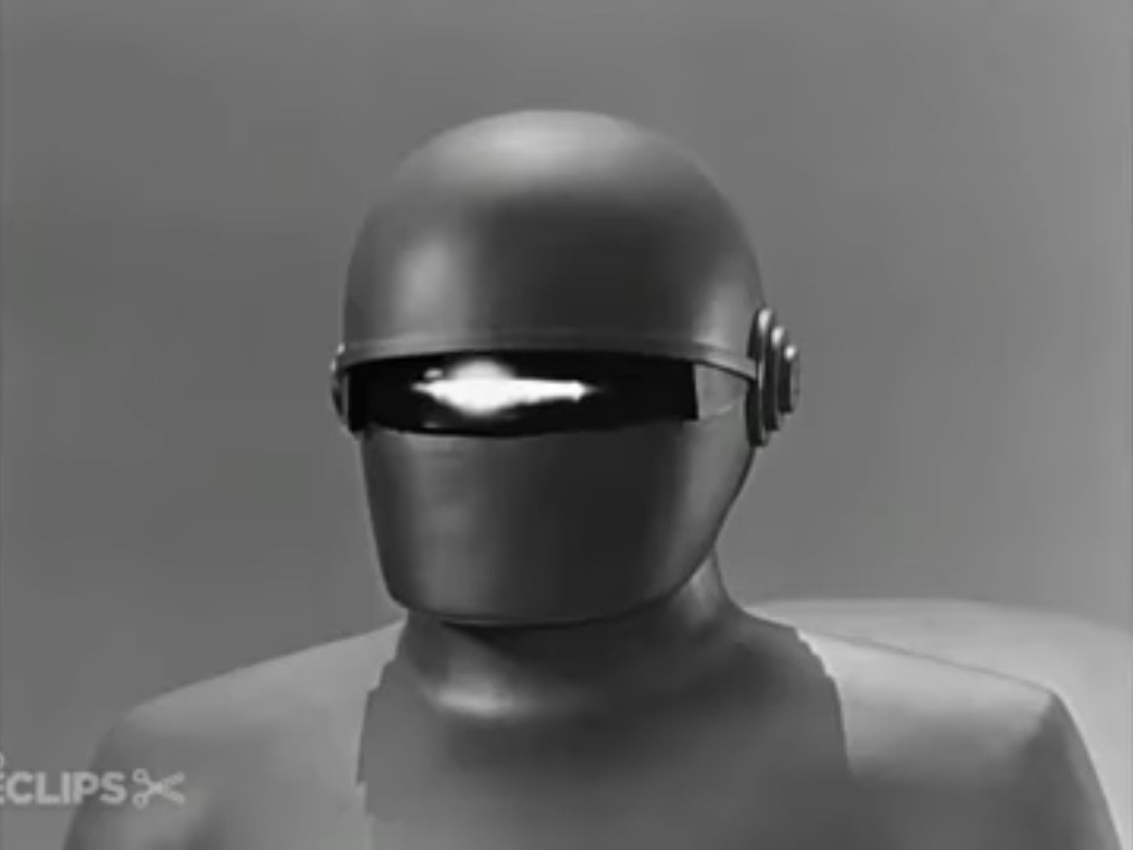 O Dia em que a Terra Parou (1951) – Dir: Robert Wise
Gort é um imponente robô alienígena que acompanha Klaatu à Terra para alertar sobre os perigos da humanidade. No filme, estrelado por Michael Rennie e Patricia Neal, Gort tem a capacidade de destruir cidades inteiras, servindo como uma força de dissuasão contra a guerra e a violência. - Reprodução