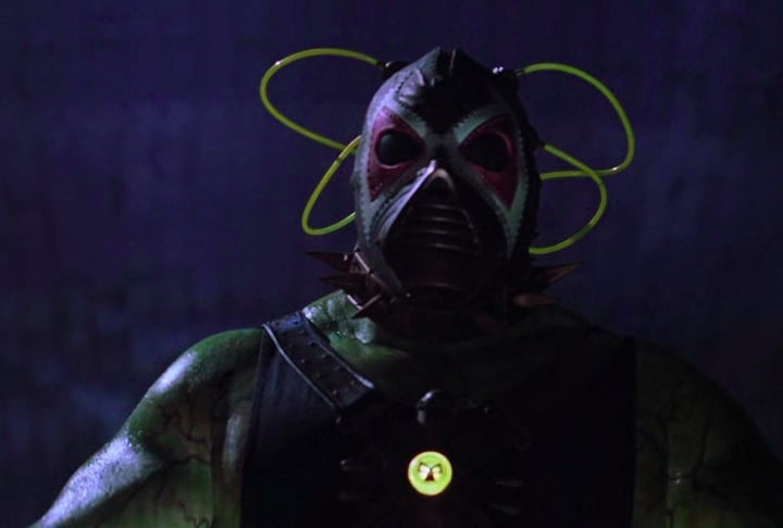 Bane: Famoso por ter conseguido quebrar o Batman nas HQs, o vilão Bane teve sua estreia nas telonas em Batman e Robin, de 1997, com o ator Jeep Swenson. O filme foi tão mal nas avaliações que pouca gente se lembra dessa versão...