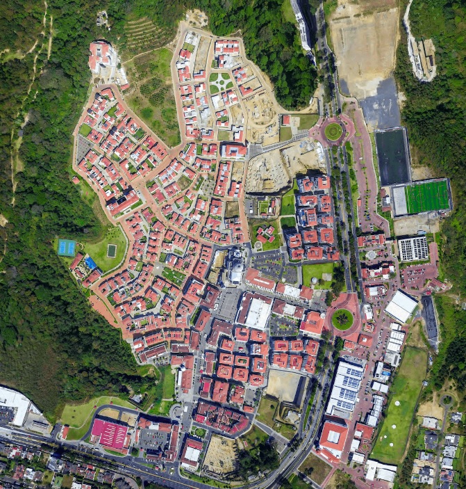 Em 2003, os arquitetos Pedro Pablo Godoy e María Sánchez apresentaram aos investidores a visão de uma cidade planejada compacta, onde tudo estaria a apenas 10 minutos de caminhada.