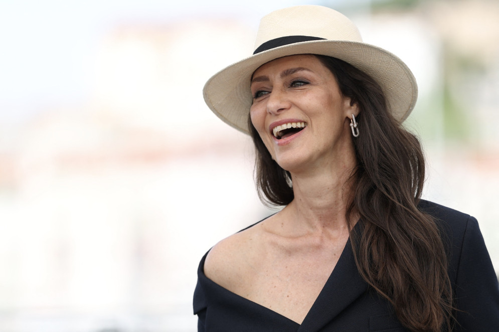 A atriz Maria Fernanda Cândido, em Cannes para a estreia do longa-metragem brasileiro O Agente Secreto, de Kleber Mendonça Filho(Foto: SAMEER AL-DOUMY / AFP)