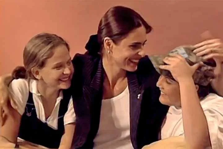 Embalada pela canção Malandragem, de Cássia Eller, Luiza é uma aluna de judô apaixonada pelo professor Dado e vive as fases de descobertas de toda adolescente. No momento, a artista segue na TV, como atriz e apresentadora e seu último papel foi em Fuzuê (2023).