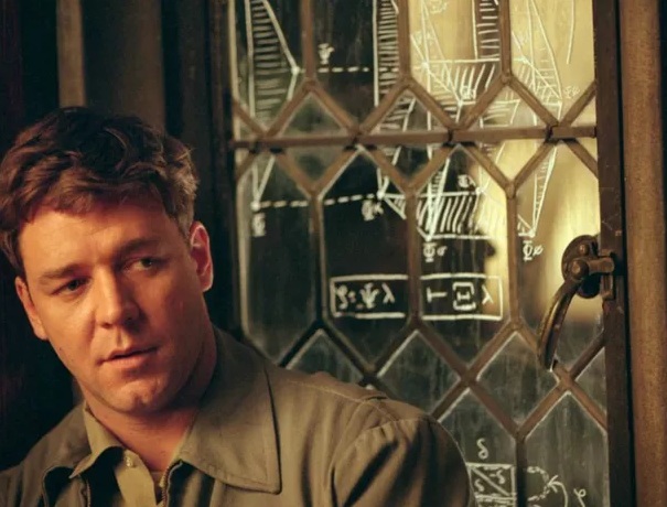 Uma Mente Brilhante (2002)
Dirigido por Ron Howard, estrelado por Russell Crowe, Jennifer Connelly e Ed Harris.
A vida do matemático John Nash, desde suas conquistas acadêmicas até sua batalha contra a esquizofrenia, destacando genialidade e superação. 