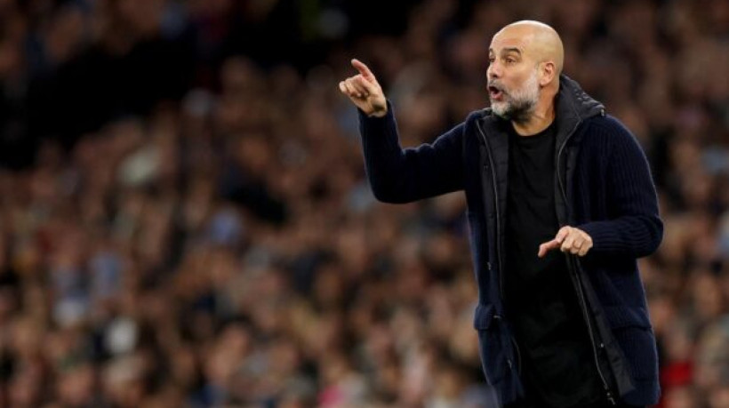 MANCHESTER, ENGLAND - DECEMBER 15:  Pep Guardiola, Manager of Manchester City, during the Premier League match between Manchester City FC and Manchester United FC at Etihad Stadium on December 15, 2024 in Manchester, England. (Photo by Carl Recine/Getty Images)