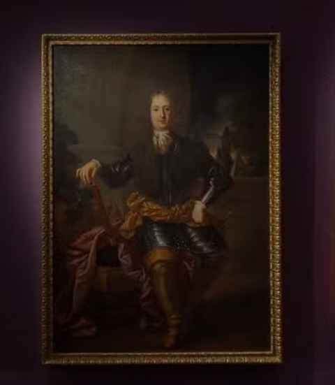 Trata-se do quadro 'Retrato de Ferdinando de Medici' , que o artista plástico Anton Domenico Gabbiani fez em 1712 para retratar o príncipe da Toscana. 