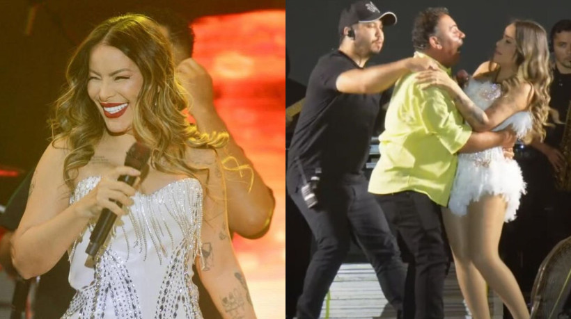 Durante uma das pausas da apresentação, um admirador da ex-vocalista da banda Magníficos, subiu ao palco e agarrou a cantora.