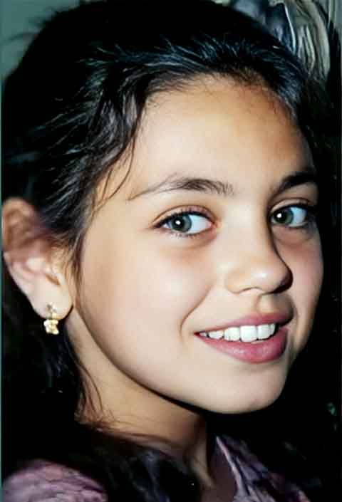 Milena Markovna Kunis nasceu em 14 de agosto de 1983, em Chernivtsi, que na época fazia parte da União Soviética e hoje é território da Ucrânia. Ela emigrou com a família para os Estados Unidos ainda criança, estabelecendo-se em Los Angeles. 
