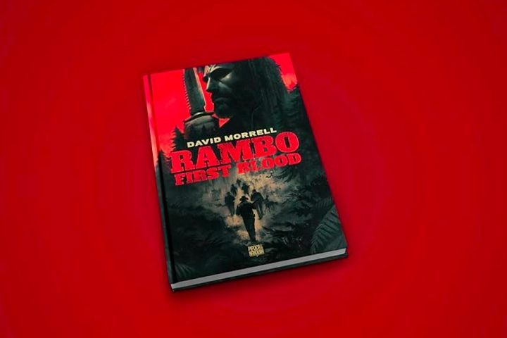 Antes mesmo de virar filme, o personagem foi criado pelo autor David Morrell no romance First Blood, de 1972.