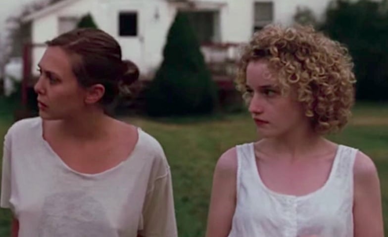 Aos 14 anos, ela começou a fazer aulas de interpretação para vencer a timidez. Em 2011, fez sua estreia no cinema no filme de suspense Martha Marcy May Marlene.