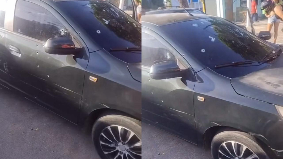 Carro foi alvejado a tiros no bairro Parangaba, em Fortaleza