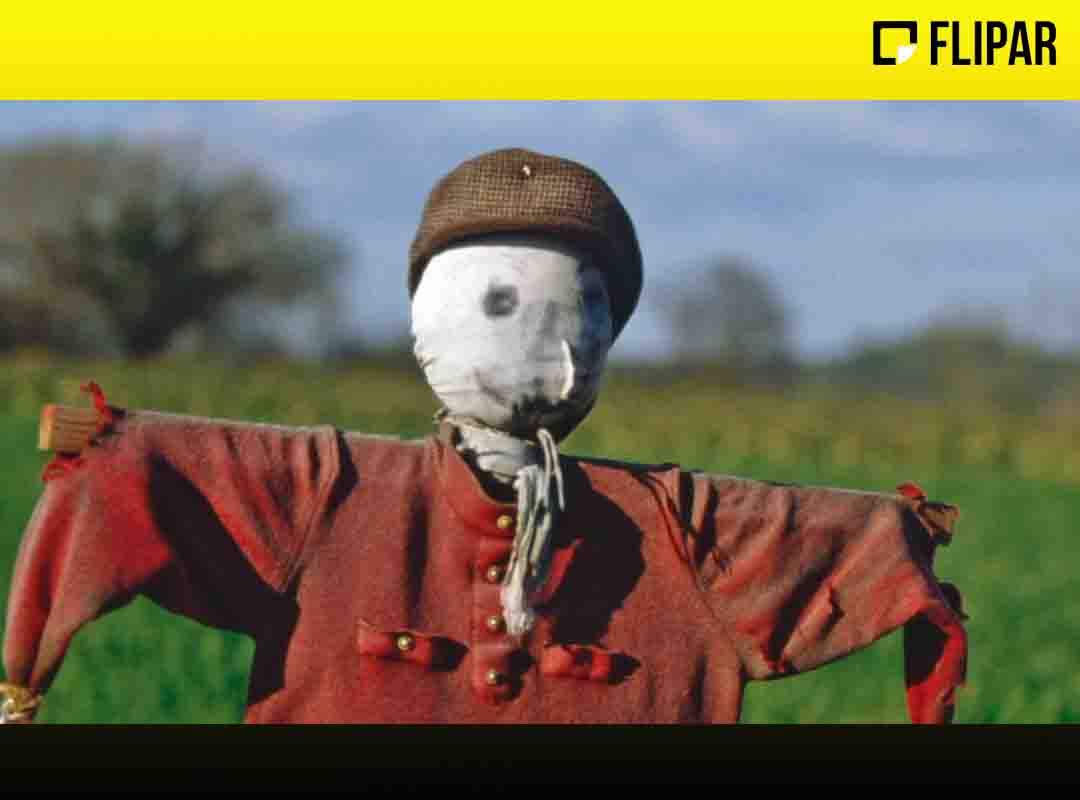 Um espantalho levemente simpático no interior britânico. 