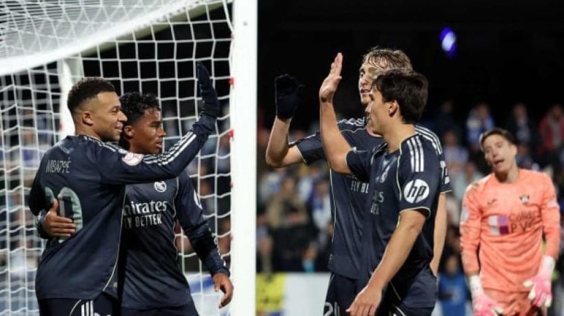 Atacante francês marca duas vezes, equipe merengue faz 3 a 2 no Talavera, da 3ª divisão, e vai às oitavas de final da competição 