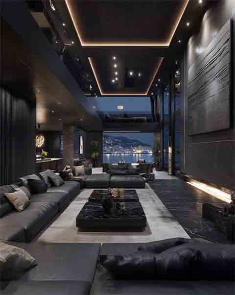 Os espaços de convívio são amplos e privilegiam a conexão com o mar, com enormes janelões que garantem vistas panorâmicas.